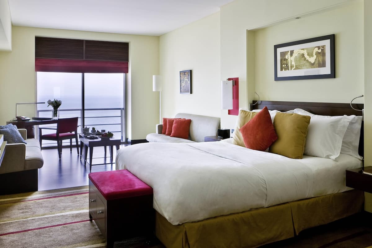 Junior Suite, 1 Queen Bed, Club lounge access, Sea View | 1 bedroom, Frette Italian sheets, premium bedding, down duvets