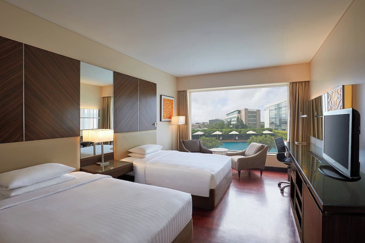 outdoor pool, open 6:30 am to 10:00 pm, pool umbrellas, pool loungers