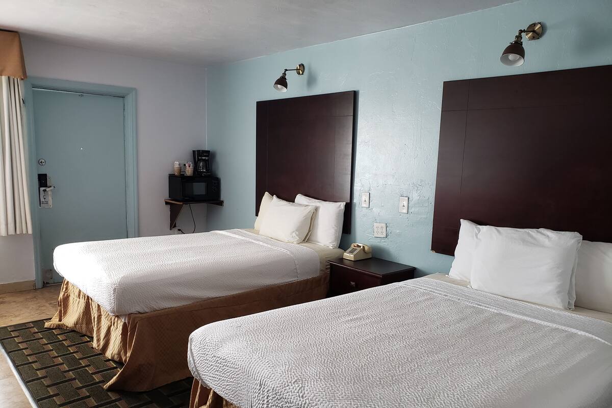 Desk, iron/ironing board, WiFi (free), alarm clocks