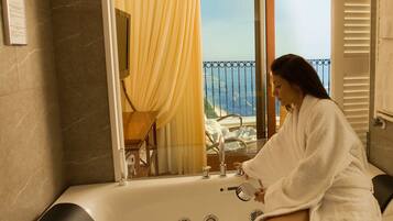 Bathtub, free toiletries, hair dryer, bathrobes