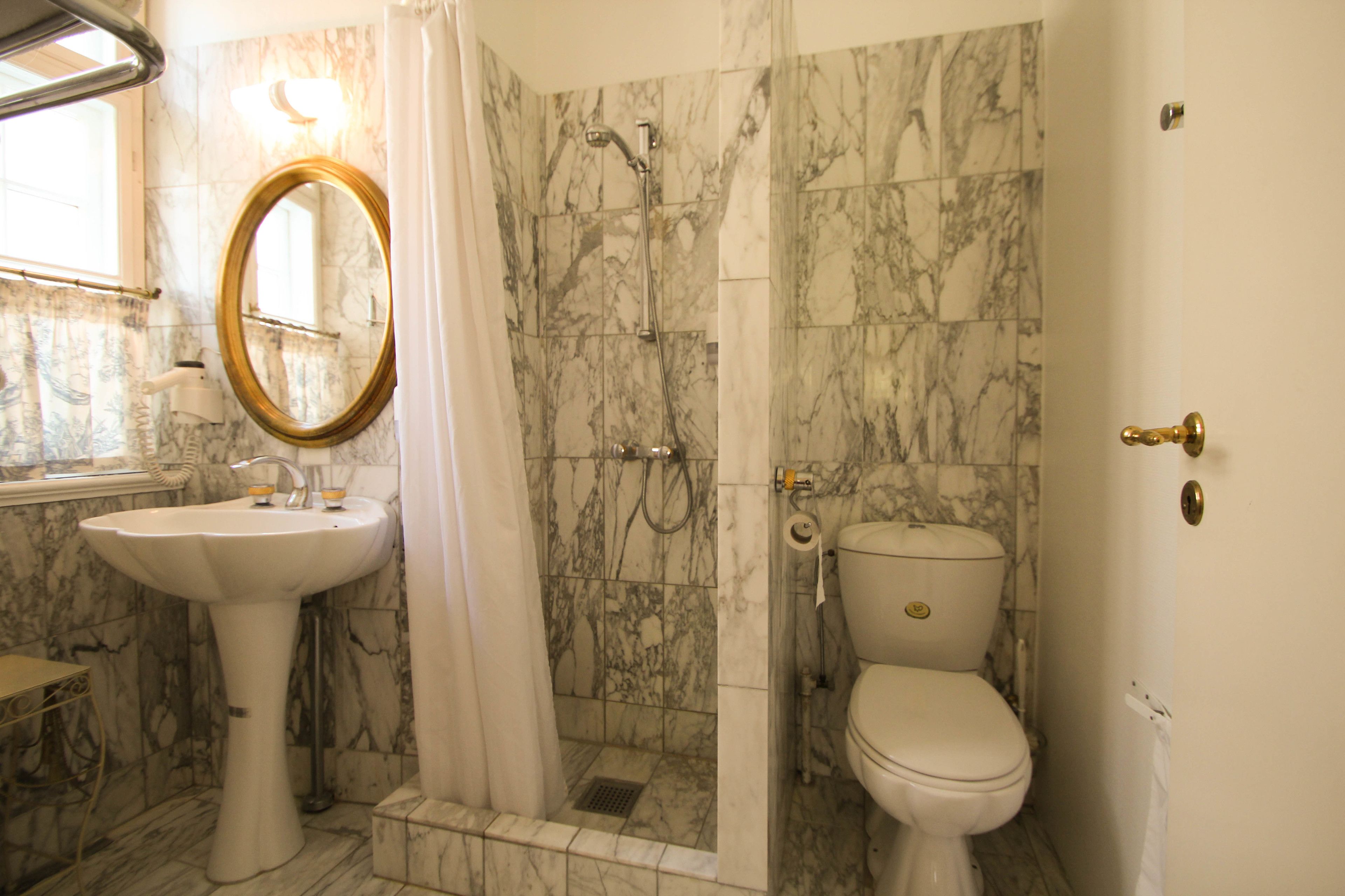 shower, eco-friendly toiletries, hair dryer, towels