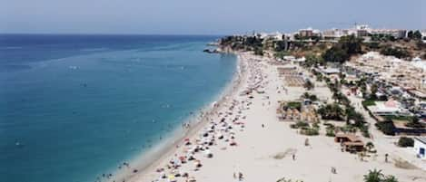 On the beach, white sand