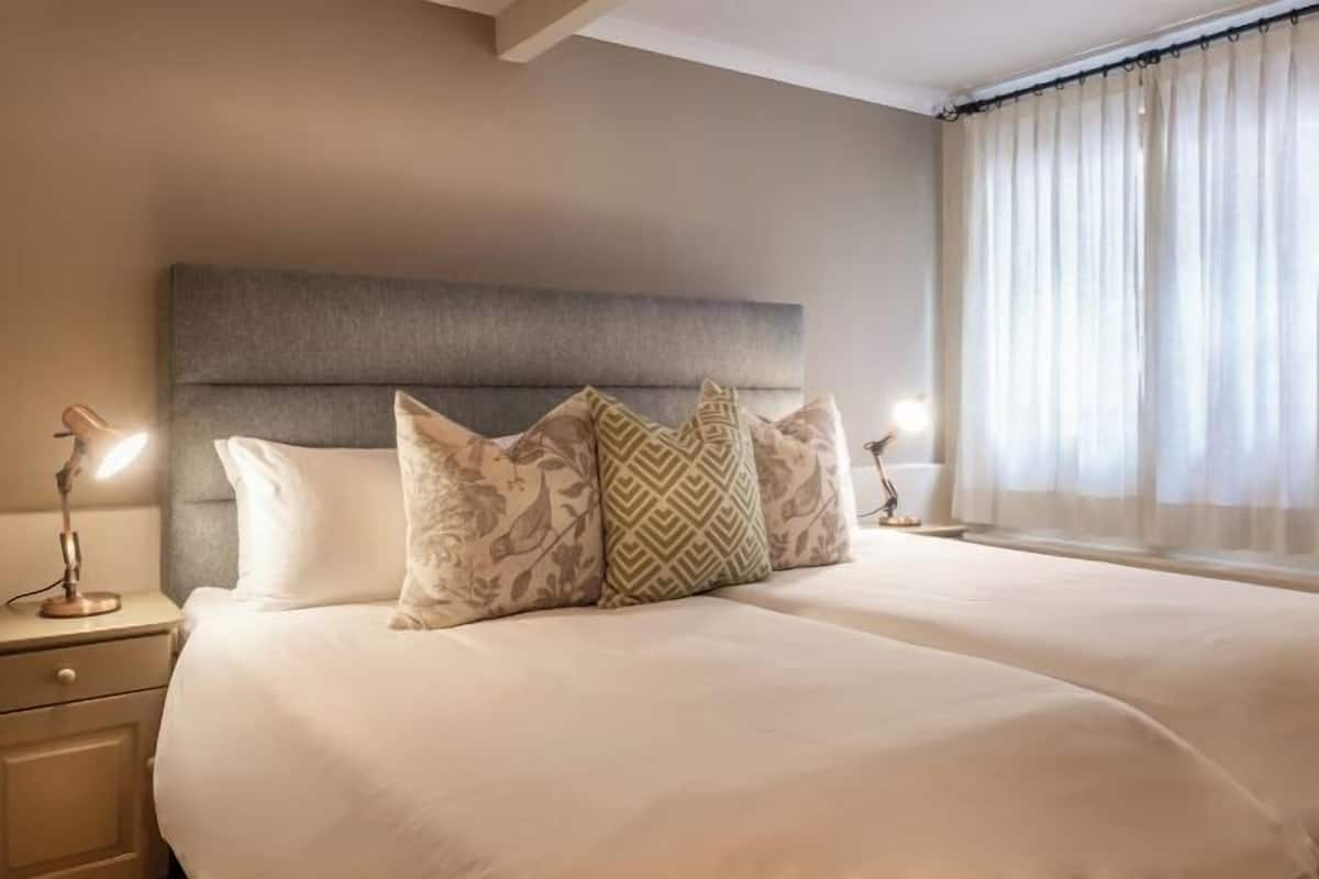 Memory foam beds, in-room safe, desk, blackout drapes