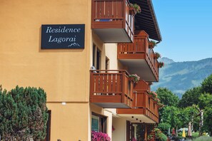 A multi-story building with a sign reading 'Residence Lagorei.' - Residence Lagorai (Tesero)