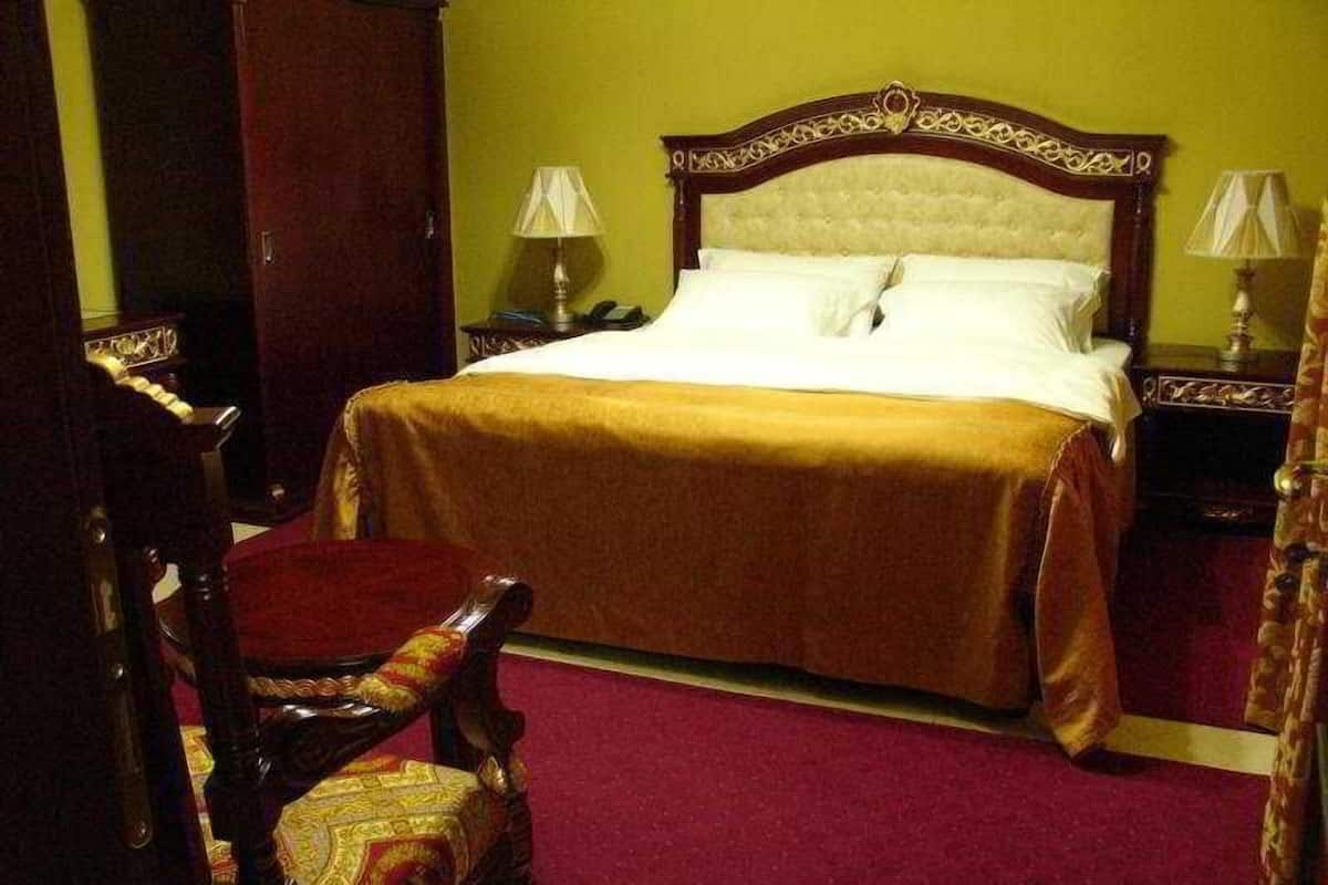 Luxe beddengoed, een minibar, een kluis op de kamer, een bureau