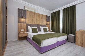 标准公寓式客房 | 迷你吧、办公桌、遮光窗帘、隔音