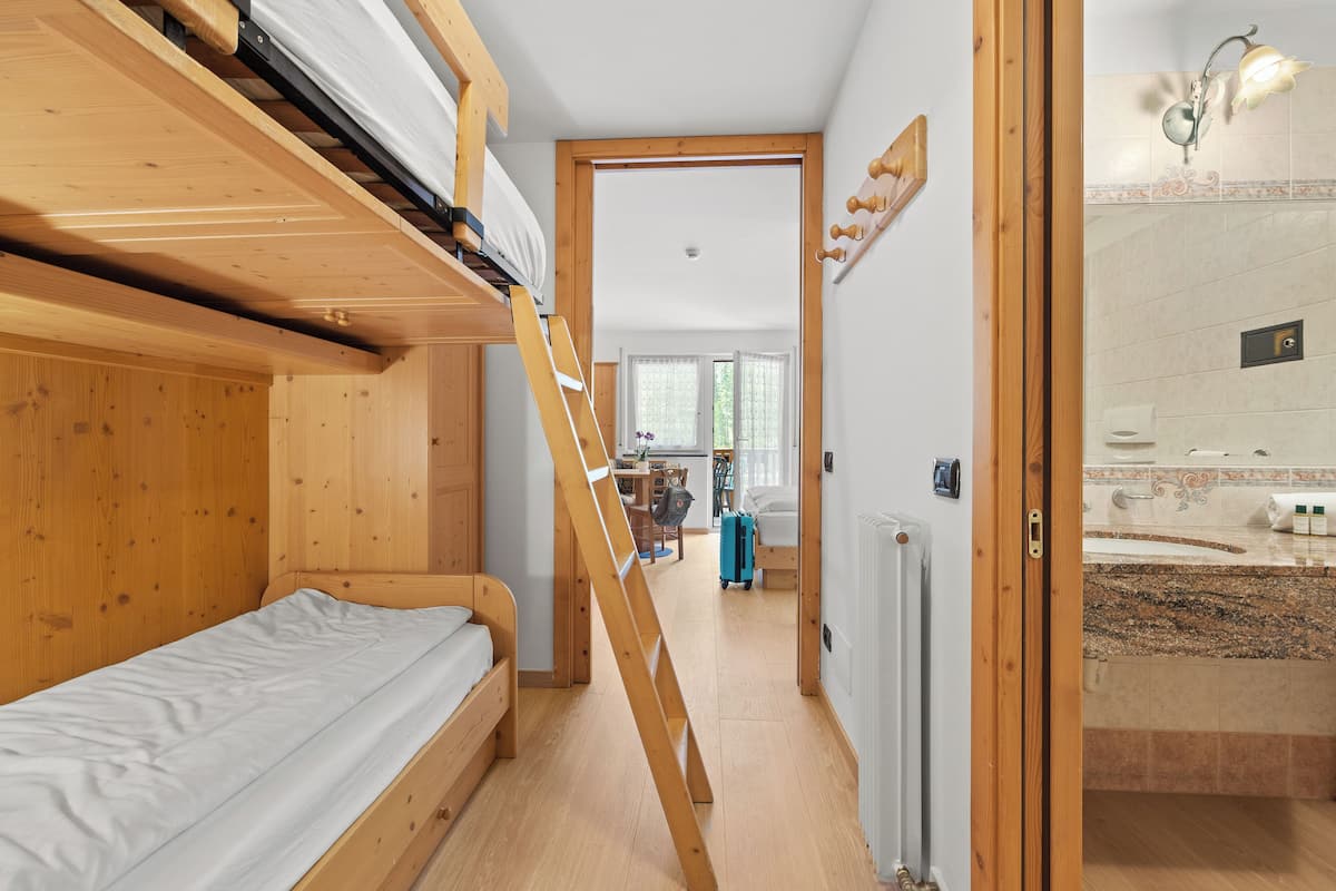 studio, balcony (4 people) | 1 bedroom, down duvets, in-room safe, blackout curtains