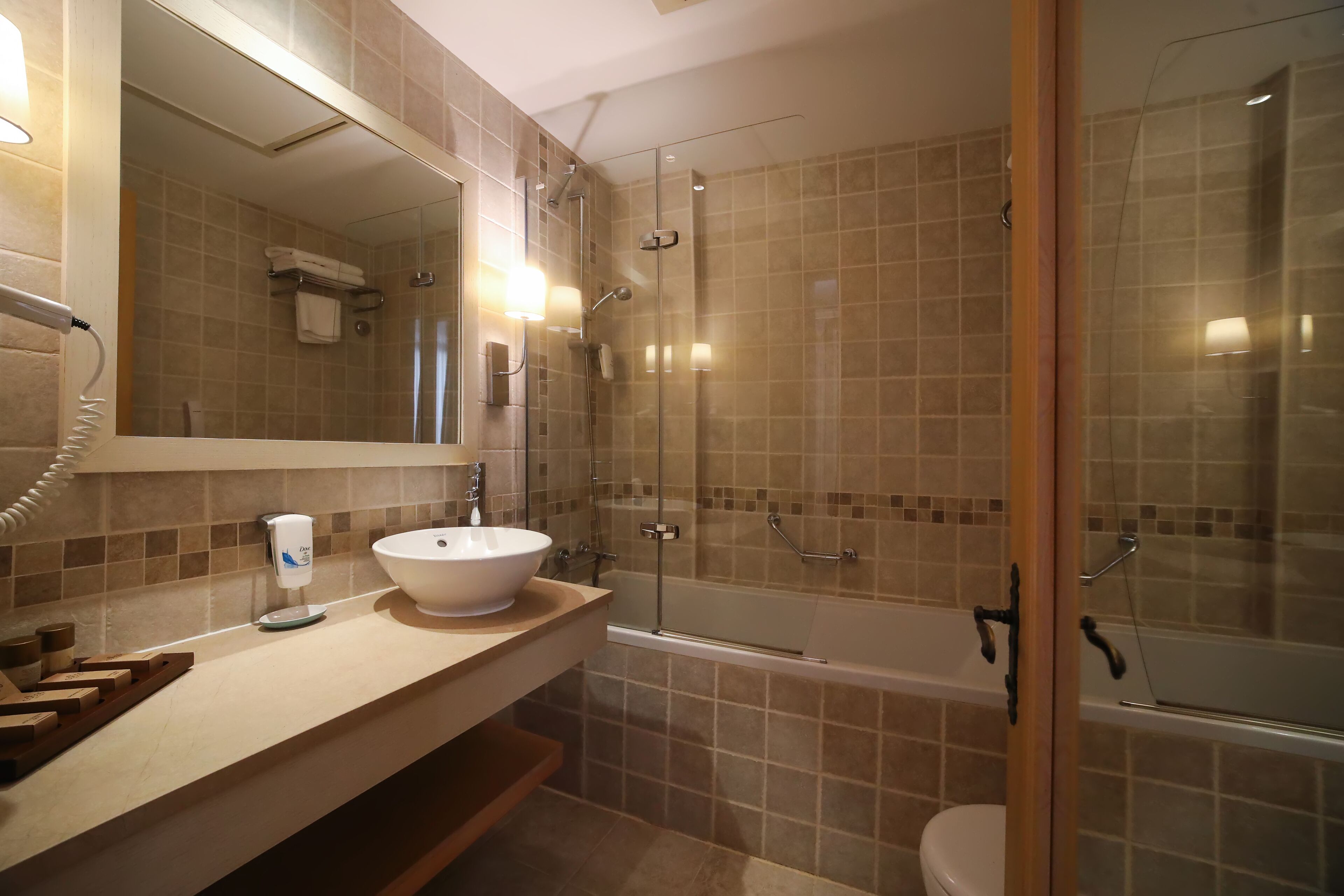 free toiletries, hair dryer, slippers, towels