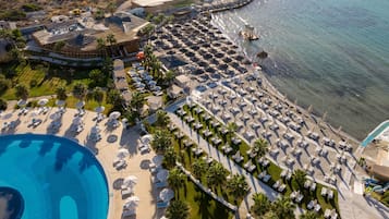 Private beach, white sand, sun-loungers, beach umbrellas
