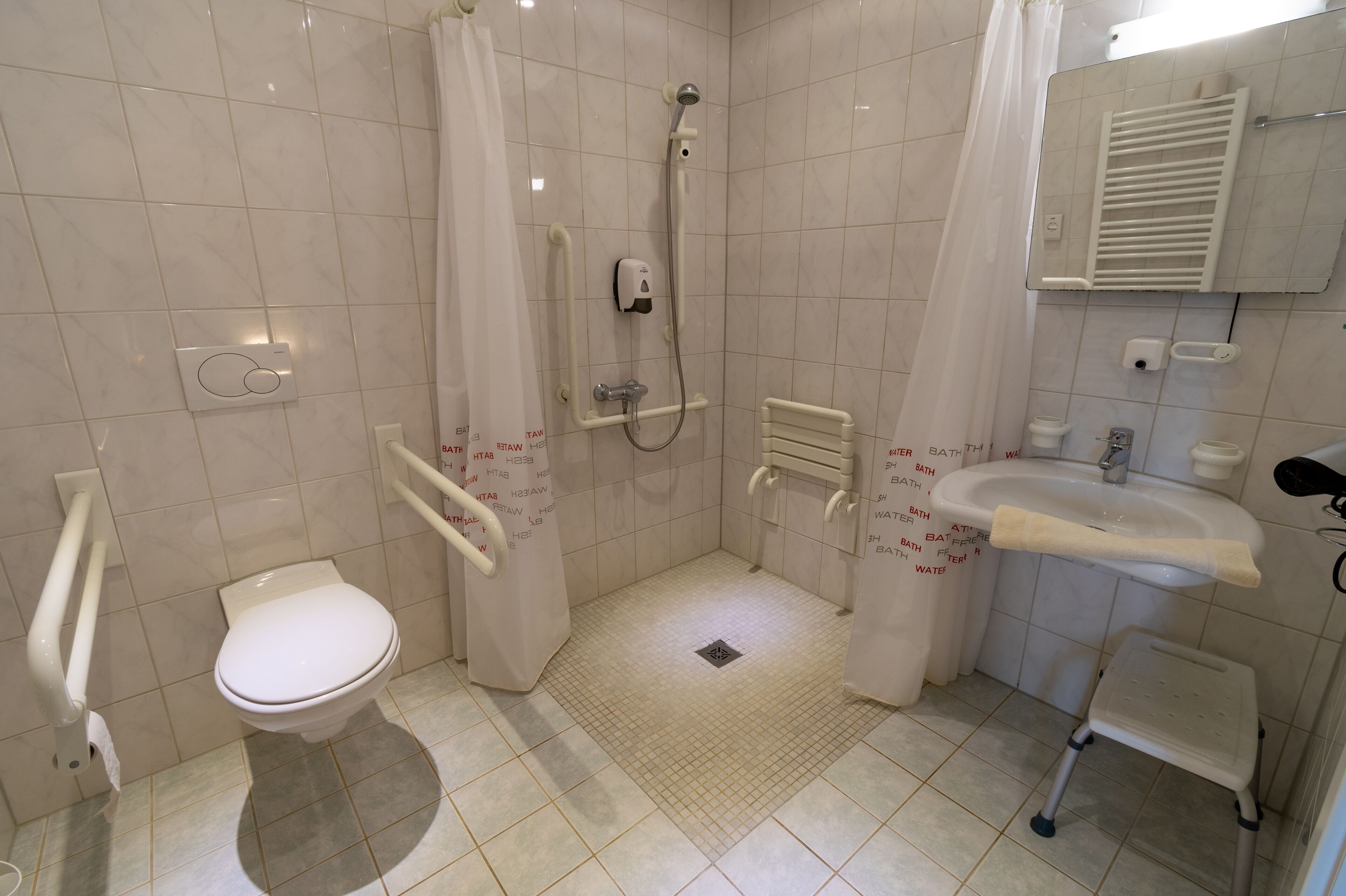 standard triple room | bathroom | shower, towels