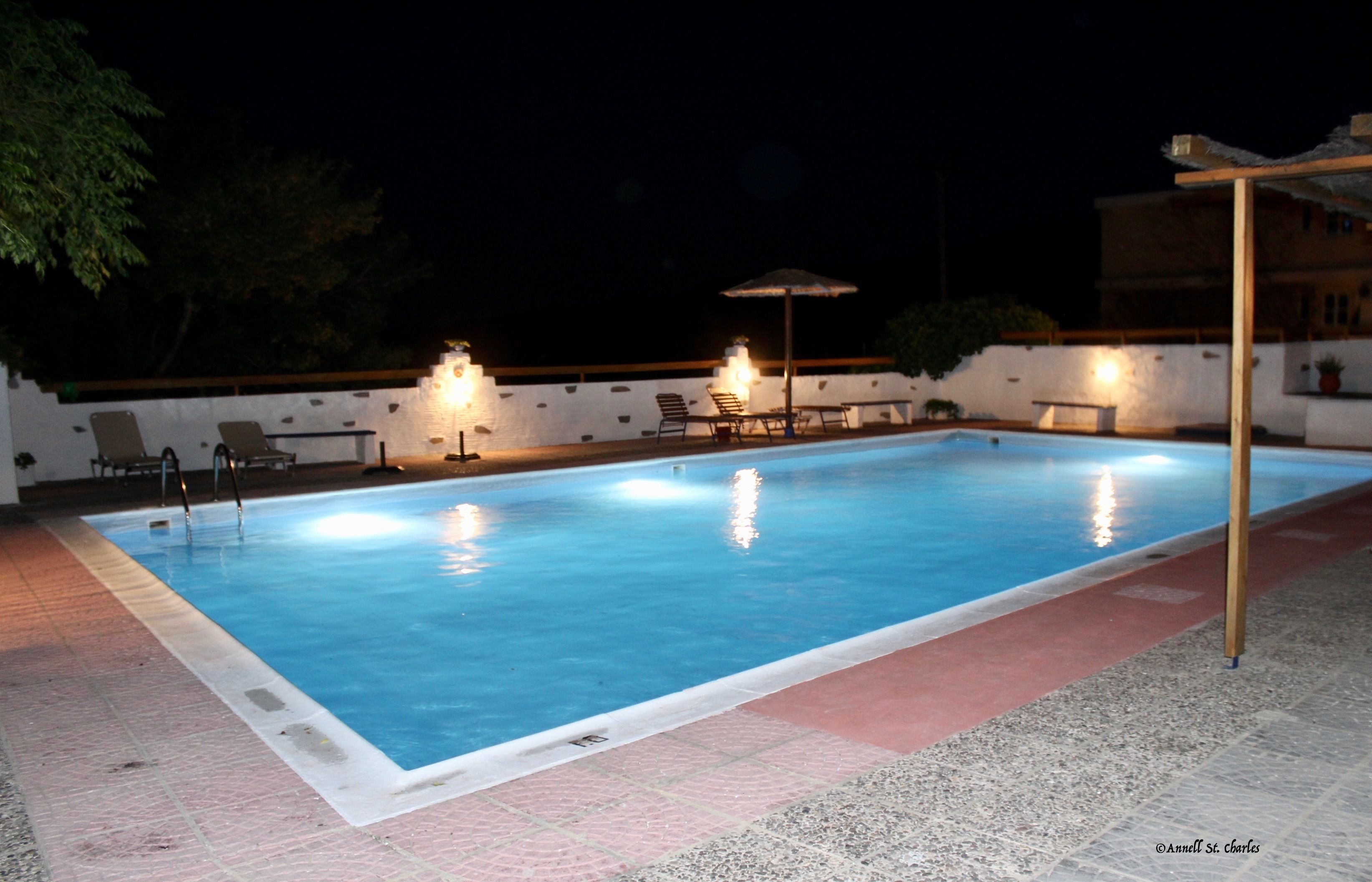 outdoor pool, pool umbrellas, pool loungers