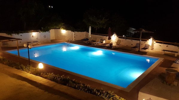 Outdoor pool, pool umbrellas, pool loungers