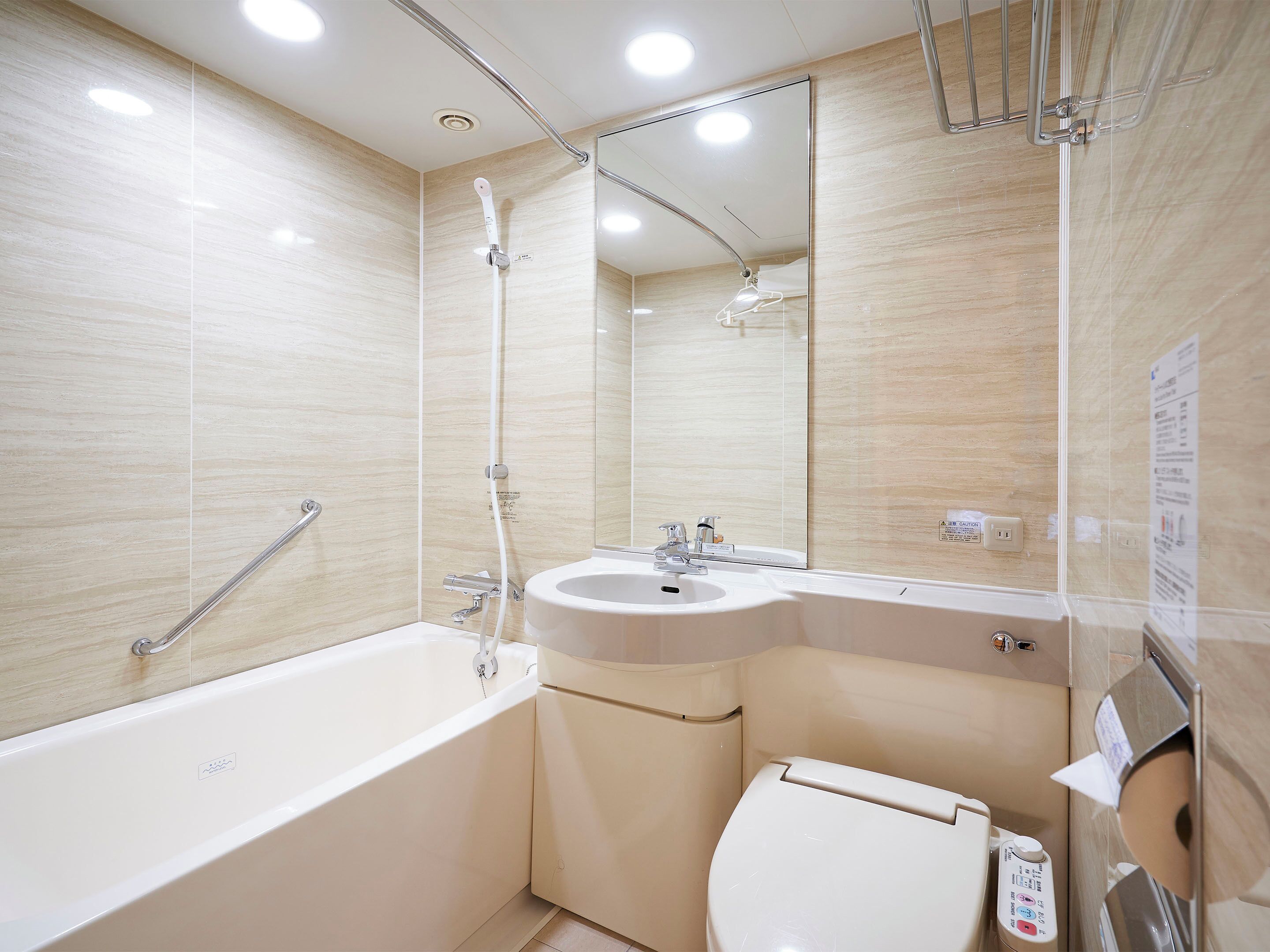 combined shower/bathtub, free toiletries, hair dryer, slippers