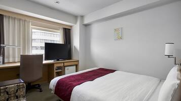 Down comforters, desk, blackout drapes, iron/ironing board (on request)