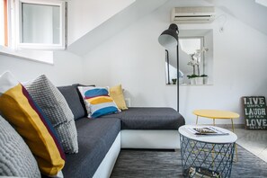 Apartment for 4 people | Living area | 27-inch LCD TV with satellite channels, TV