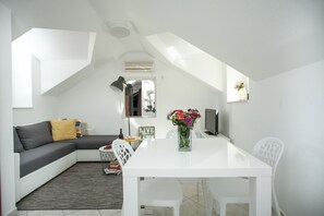 Apartment for 4 people | Living area | 27-inch LCD TV with satellite channels, TV