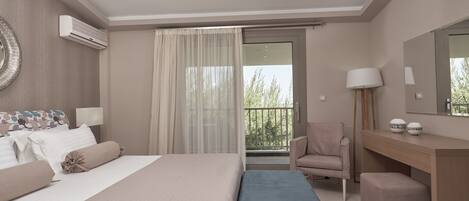 A modern bedroom with a large bed, a desk, a chair, and a balcony with a view.
