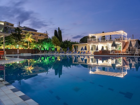 2 outdoor pools, open 9:30 AM to 7 PM, pool umbrellas, pool loungers. Koukounaria Hotel & Suites