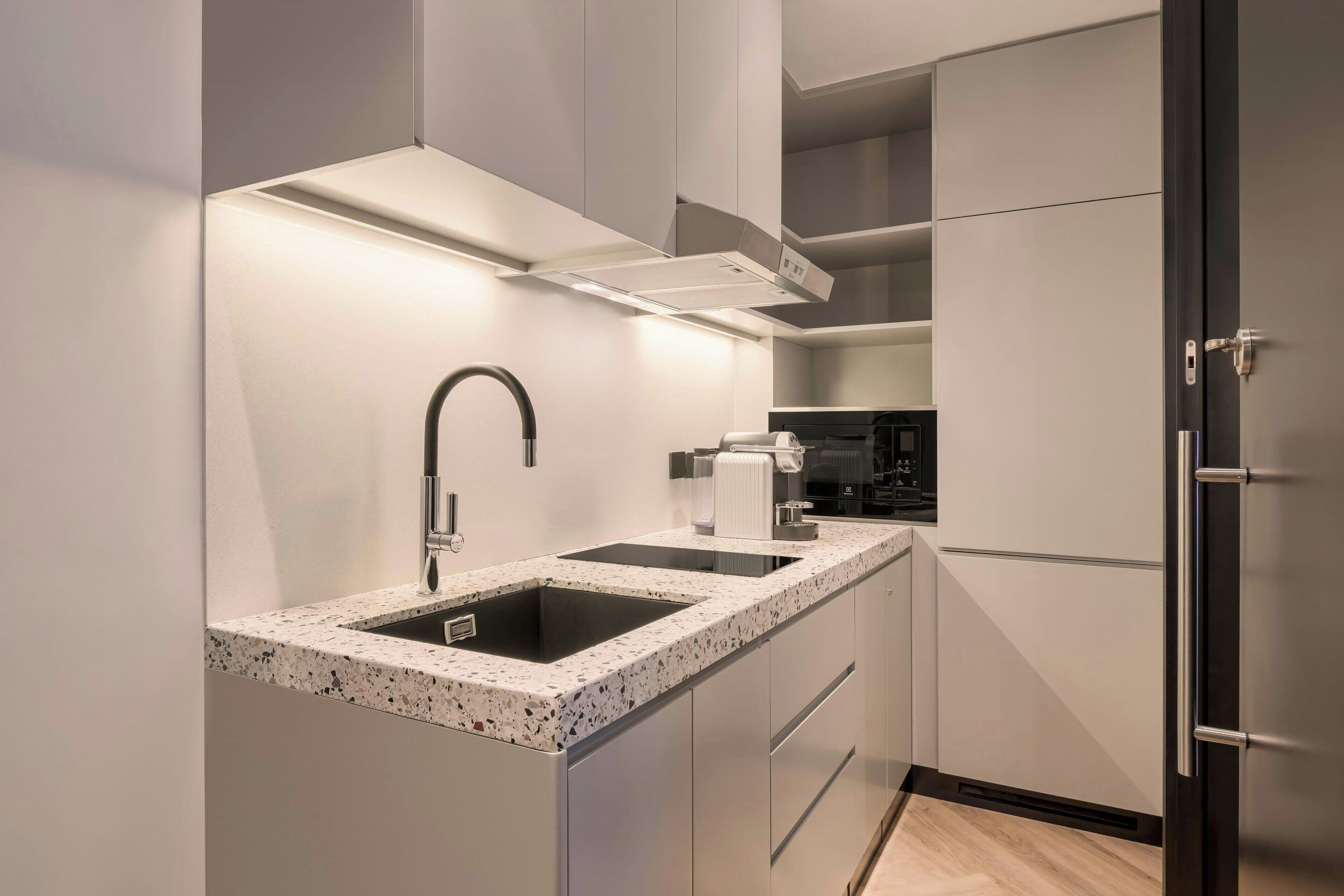 Mini-fridge, coffee/tea maker, highchair, dining tables