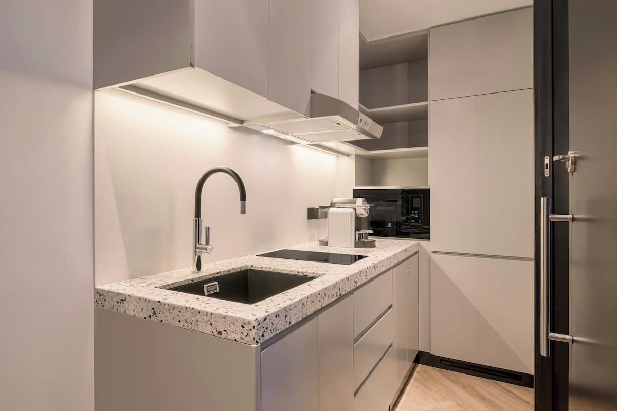 Mini-fridge, coffee/tea maker, highchair, dining tables