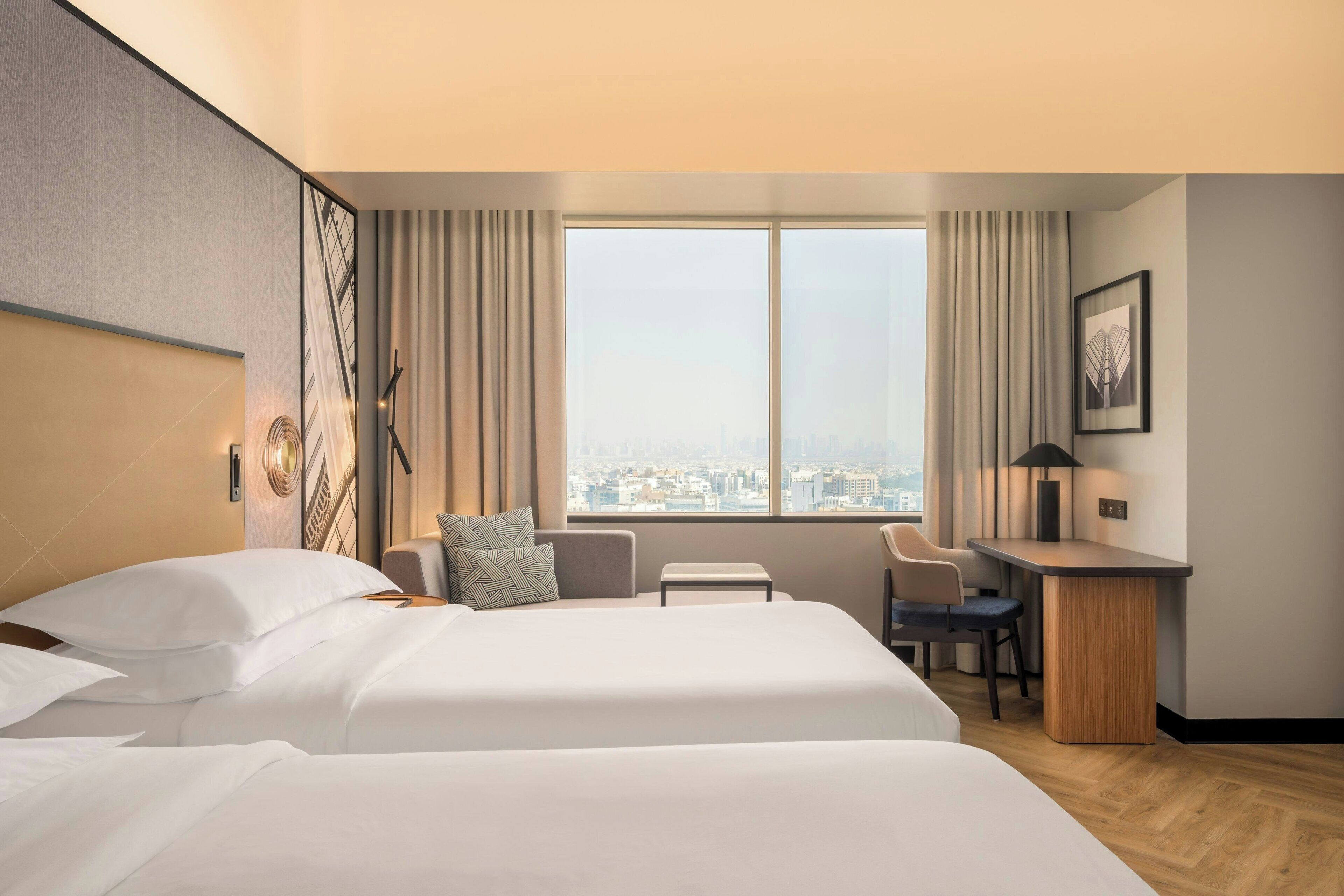 Hypo-allergenic bedding, down comforters, pillowtop beds, minibar