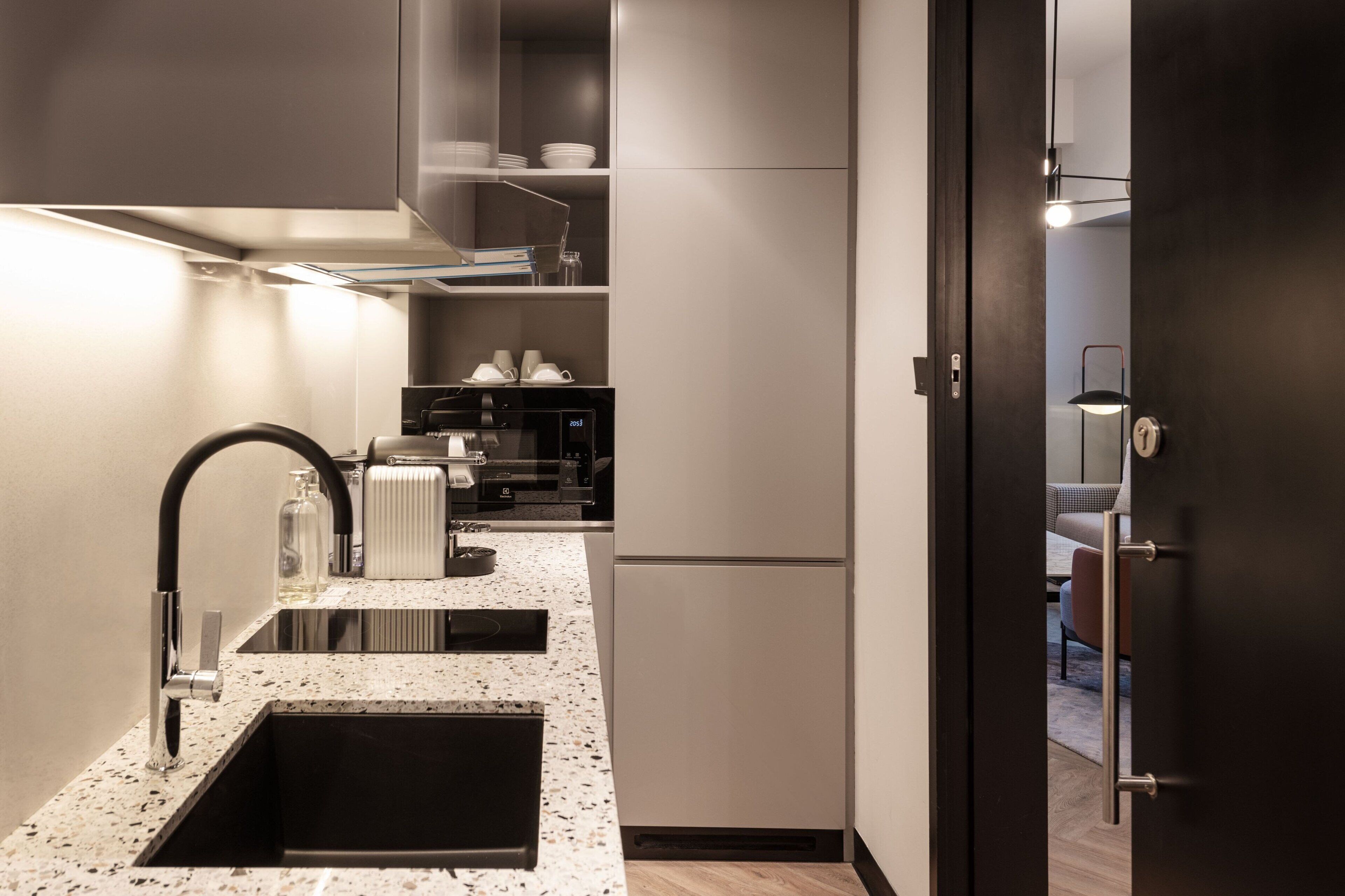 club suite, 1 bedroom | private kitchen | mini-fridge, coffee/tea maker, high chair, dining tables