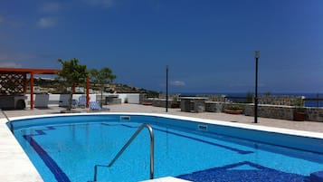Outdoor pool, pool umbrellas, pool loungers