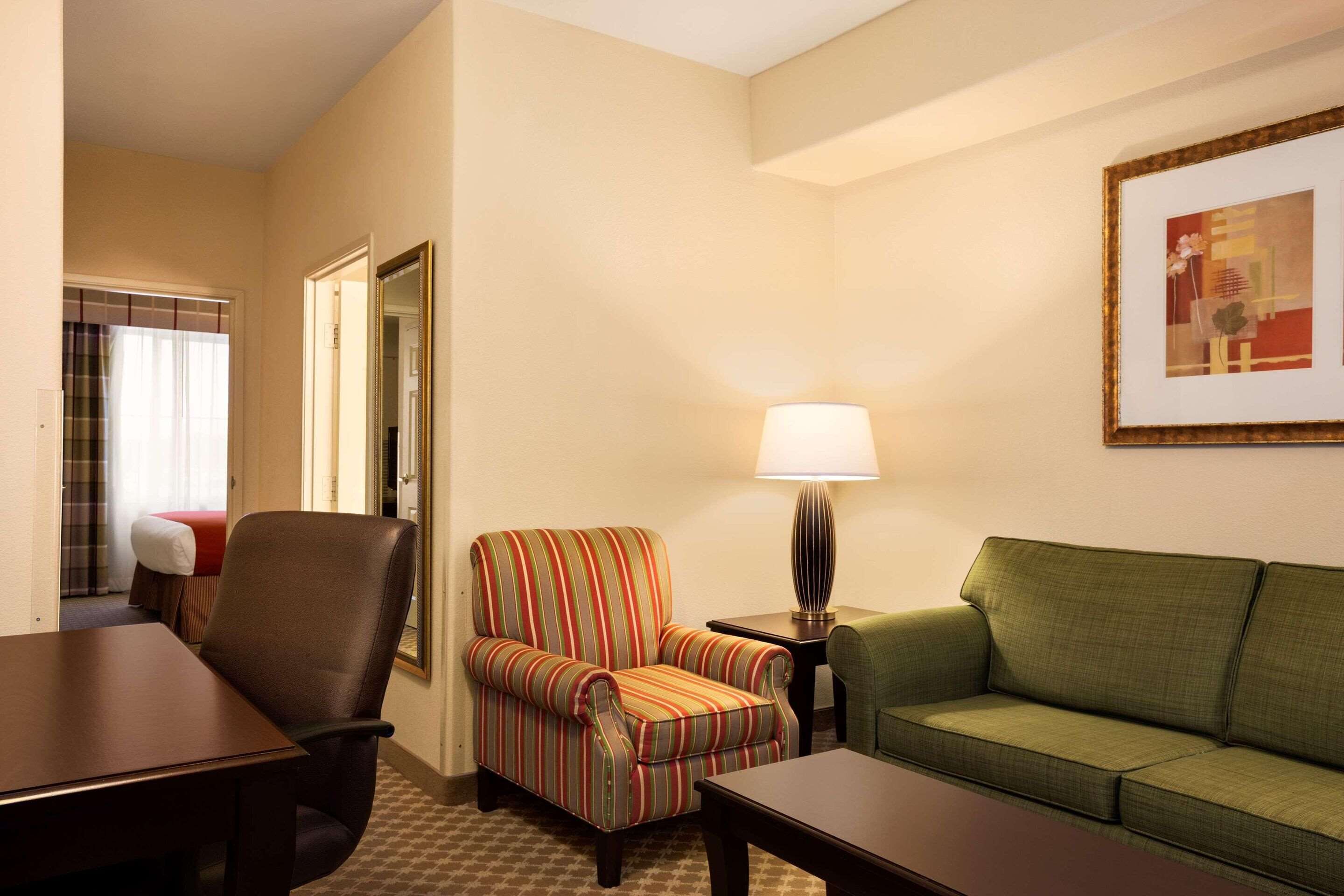 suite, 1 bedroom, non smoking | in-room safe, desk, laptop workspace, soundproofing