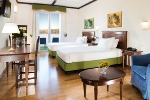 Premium bedding, down duvets, minibar, in-room safe