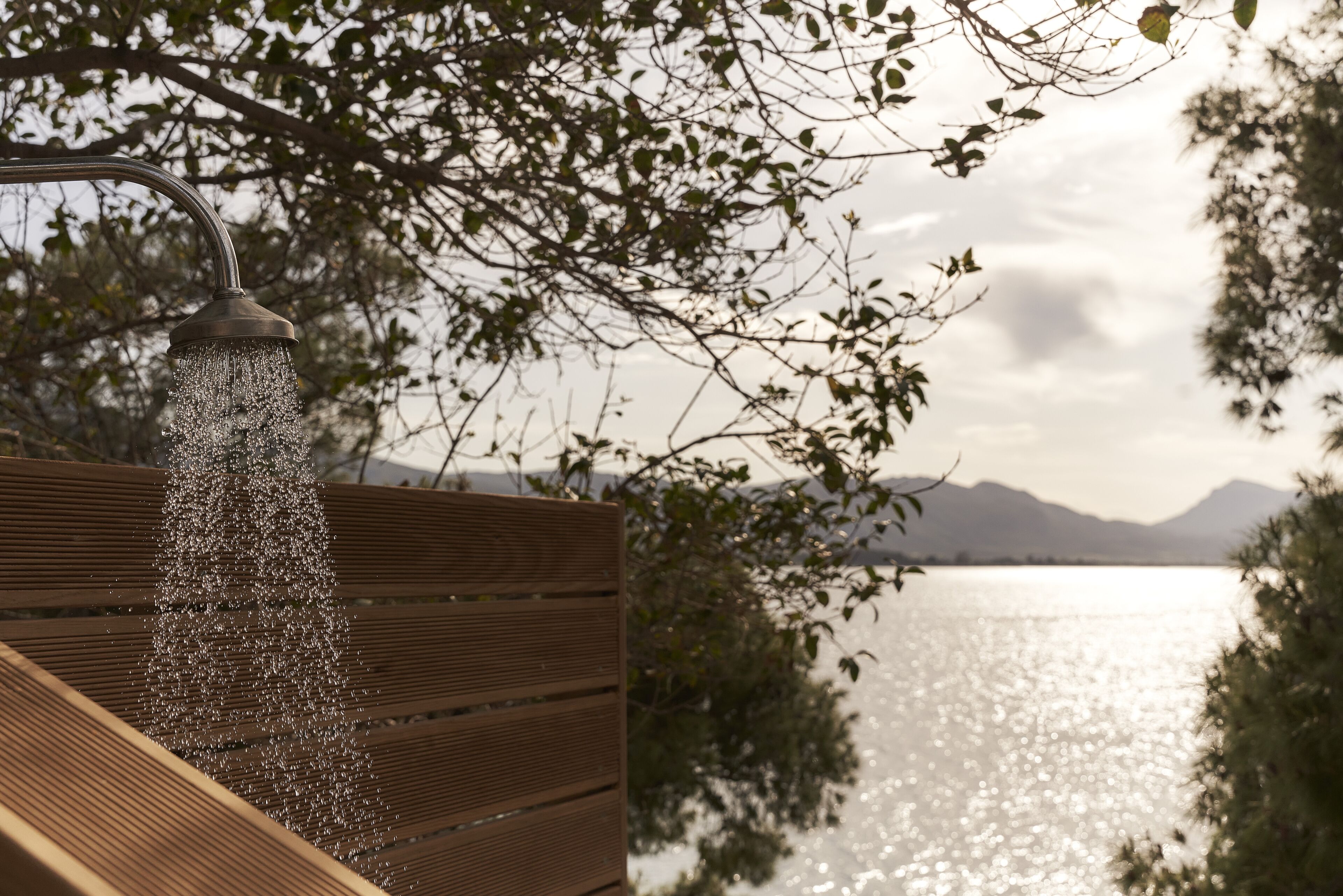 seasonal outdoor pool, pool umbrellas, pool loungers