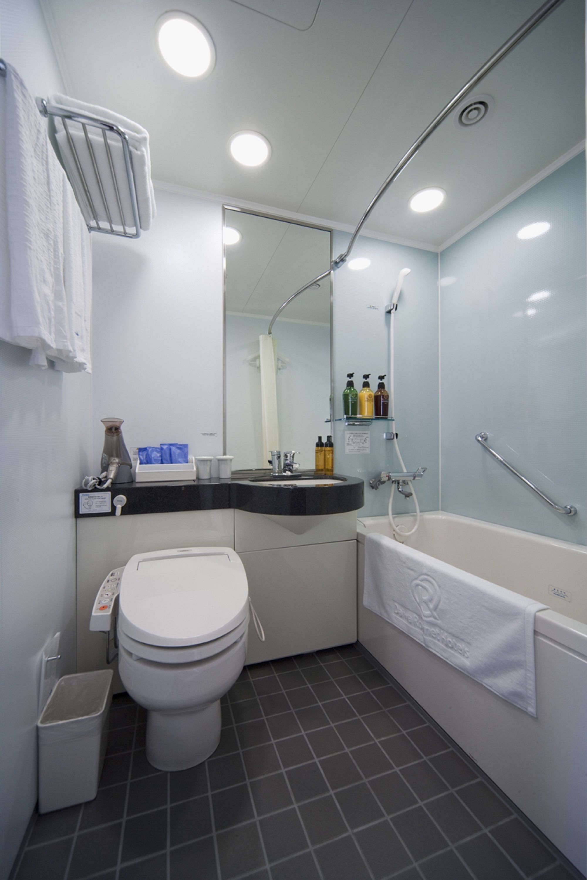 combined shower/bathtub, free toiletries, hair dryer, slippers