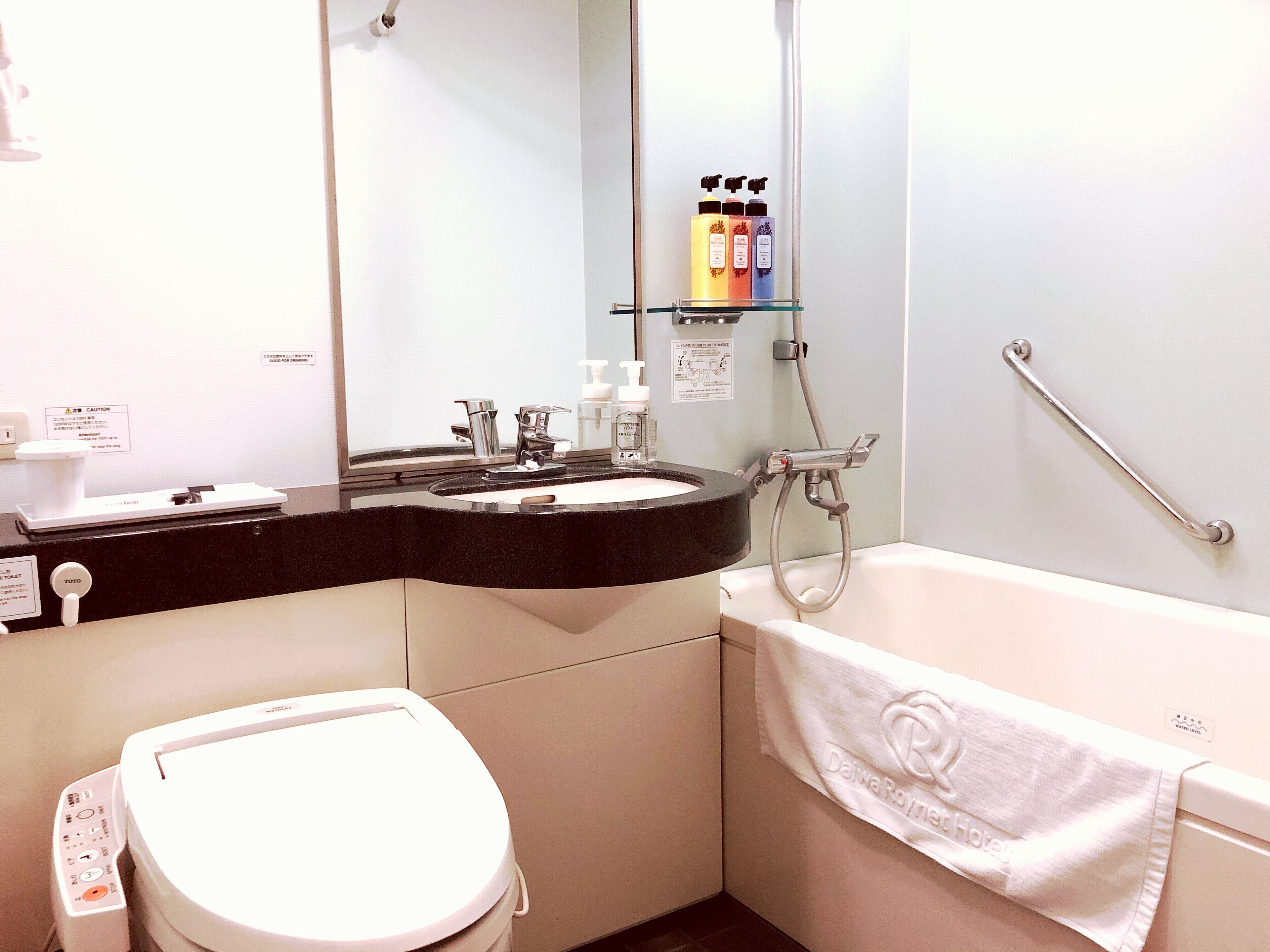 combined shower/bathtub, free toiletries, hair dryer, slippers