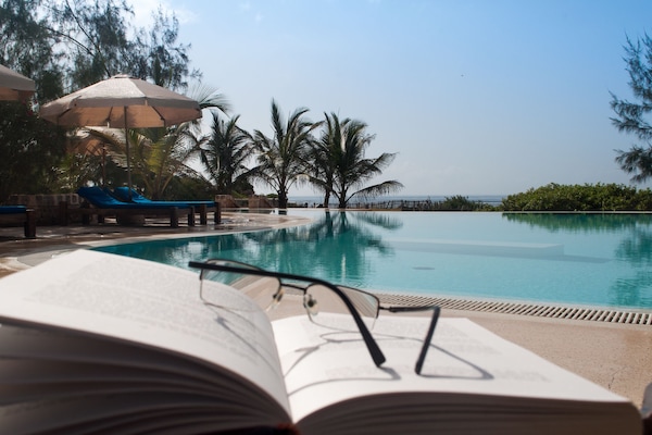 Outdoor pool, free cabanas, pool umbrellas