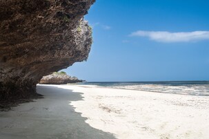 Private beach, beach umbrellas, beach towels