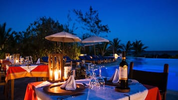 Breakfast, lunch served; local and international cuisine, pool views