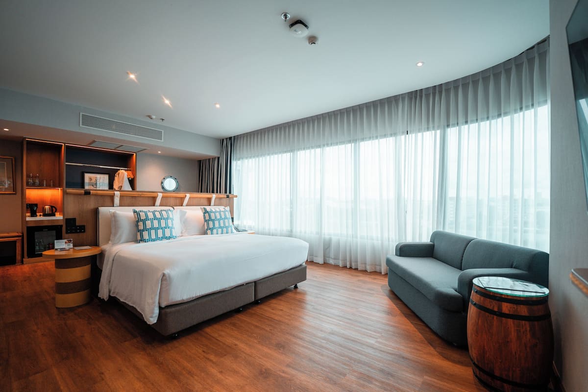 Suite Junior, 1 très grand lit | Literie de qualité supérieure, minibar, coffres-forts dans les chambres