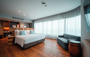 Suite junior, 1 cama King size | Ropa de cama de alta calidad y caja de seguridad en la habitación 