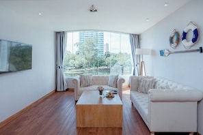 Suite, 2 Bedrooms | Living area | 50-inch Smart TV with digital channels, TV - Ocean Marina Resort Pattaya Jomtien (Sattahip)