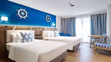 Deluxe-værelse - 2 enkeltsenge | Premium-sengetøj, minibar, pengeskab på værelset, skrivebord