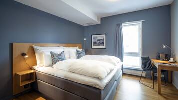 1 bedroom, premium bedding, down comforters, individually decorated