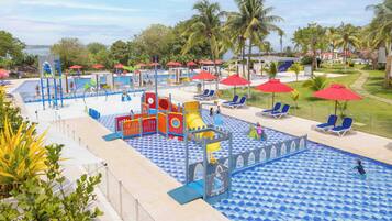 Relax by the pool and let kids play in the adjacent play area with slides and play structures.