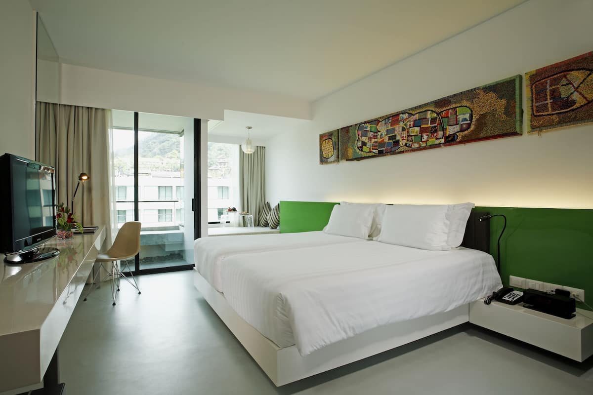 Premium bedding, free minibar items, in-room safe