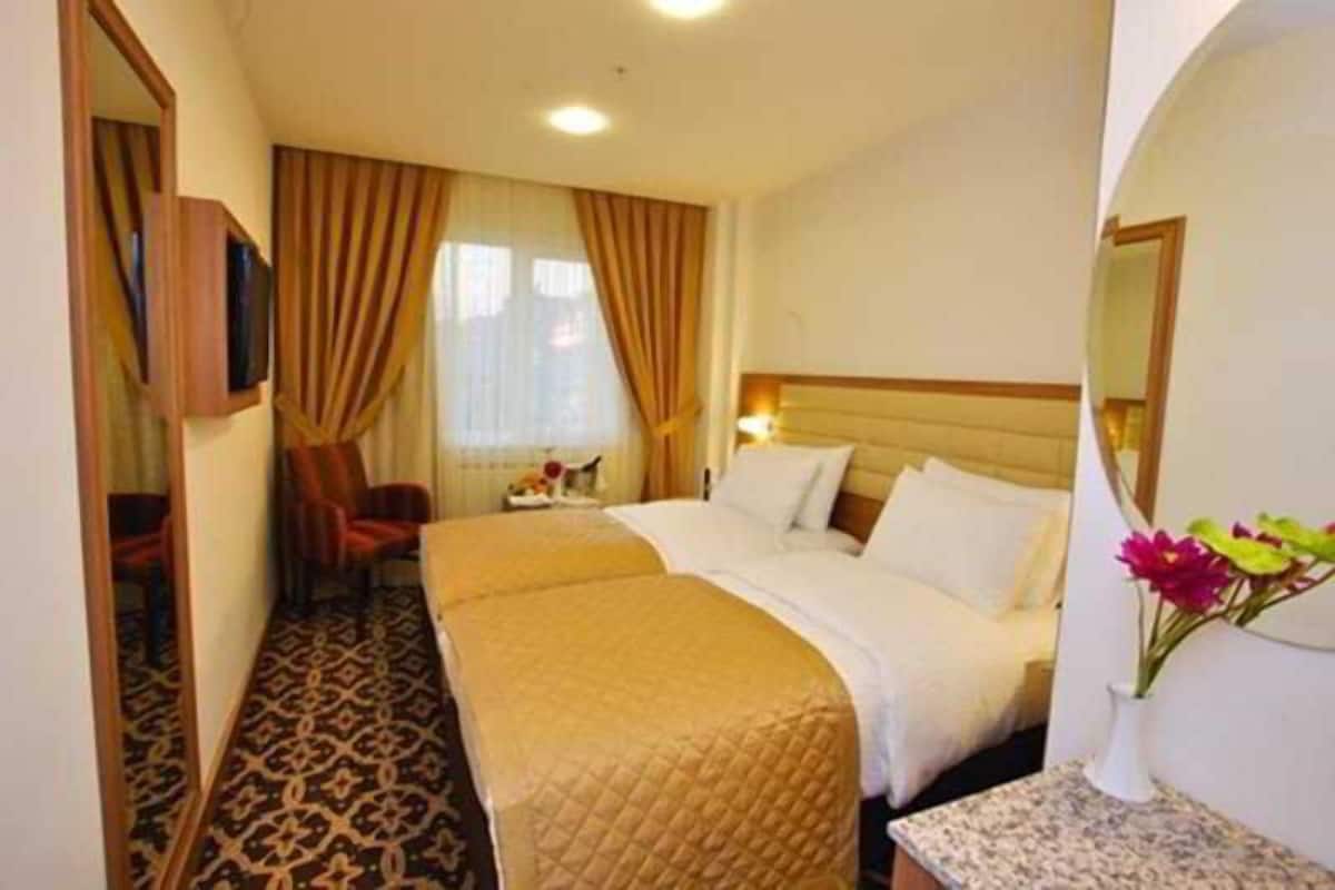 Premium bedding, down duvets, Select Comfort beds, minibar