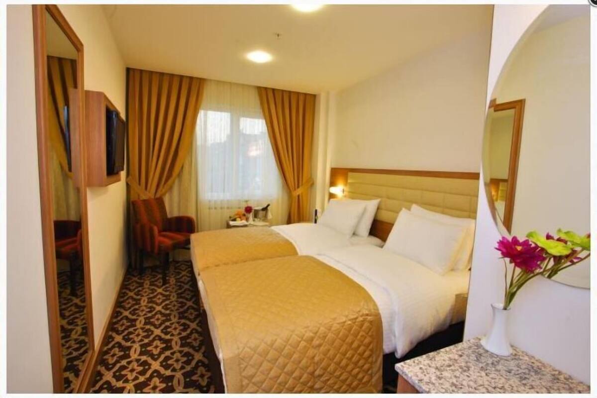 Hochwertige Bettwaren, Daunenbettdecken, Select-Comfort-Betten, Minibar