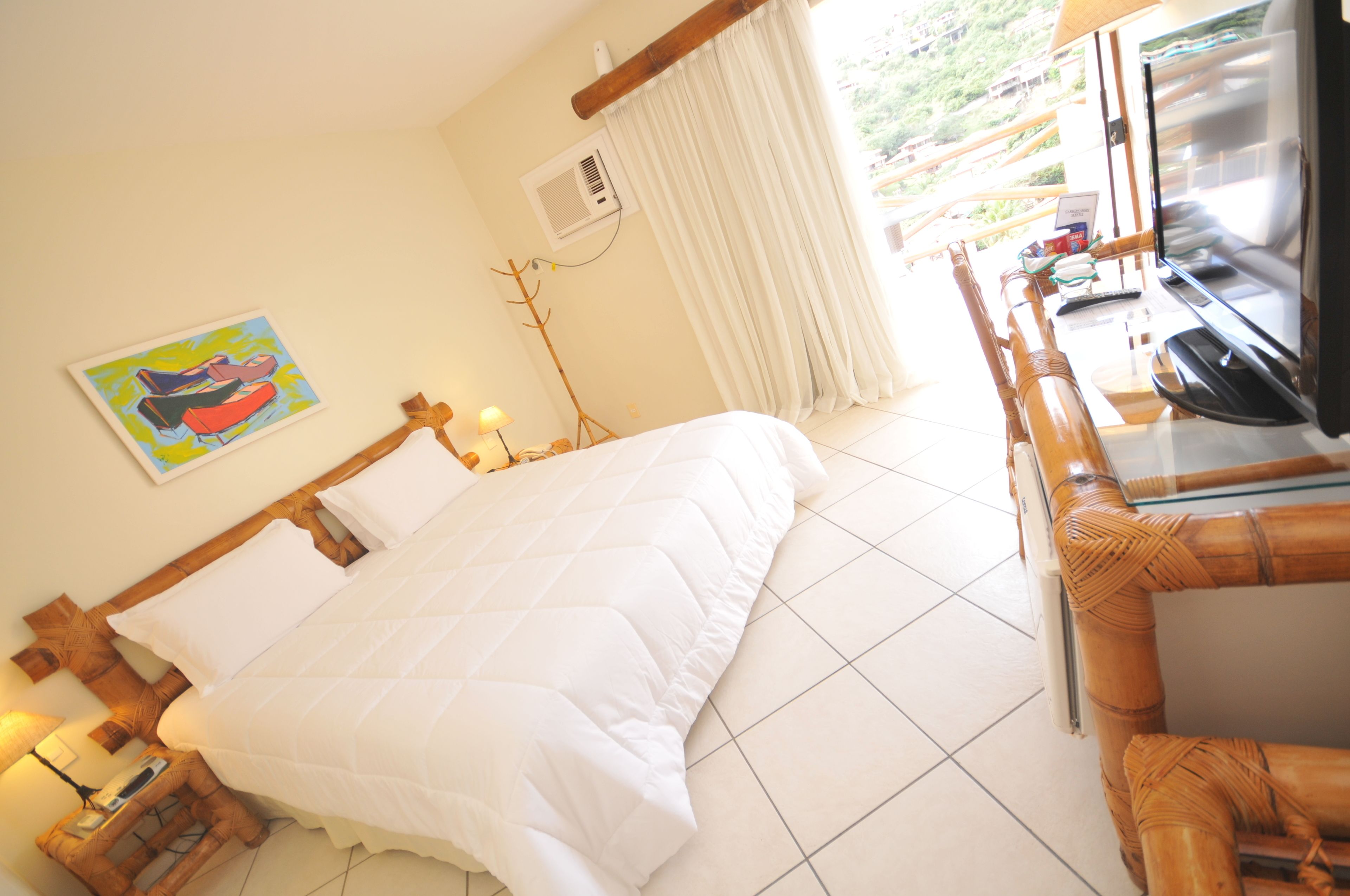 standard double room, 1 king bed, garden view, garden area | room amenity