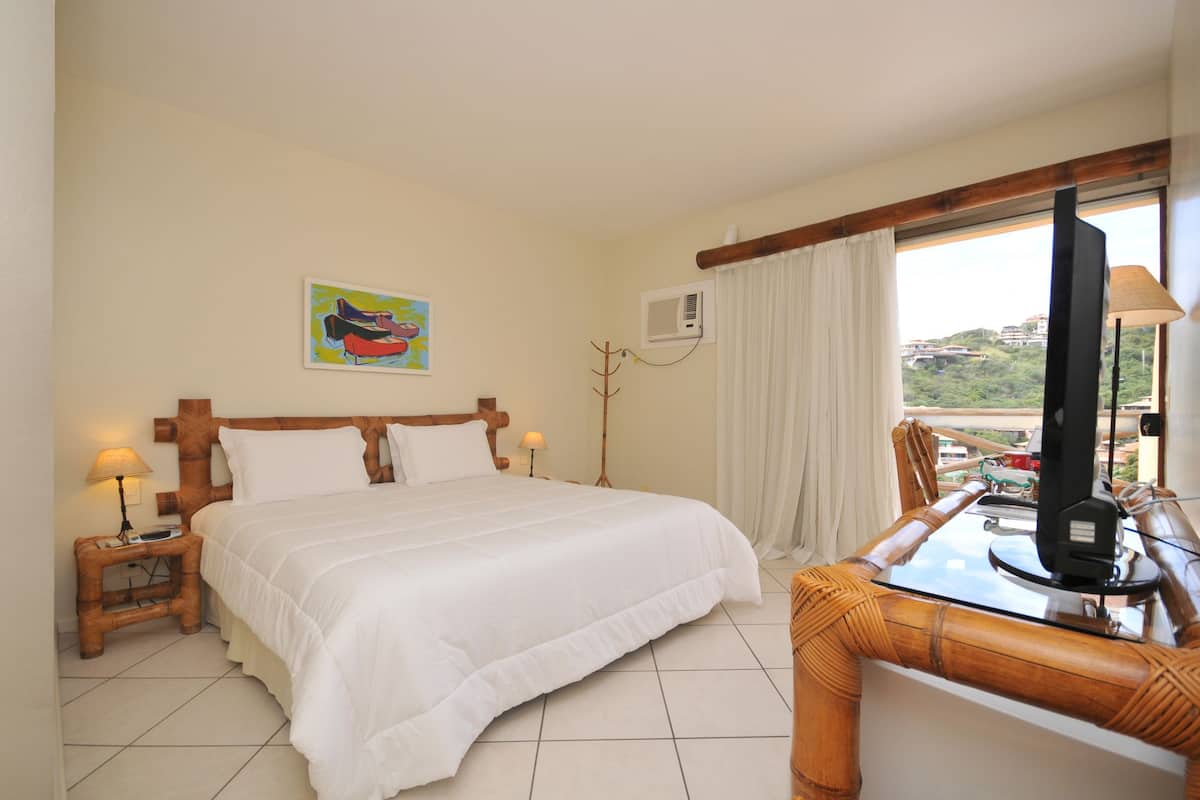 deluxe double room, 1 bedroom, hot tub, garden view | 1 bedroom, minibar, in-room safe, blackout curtains