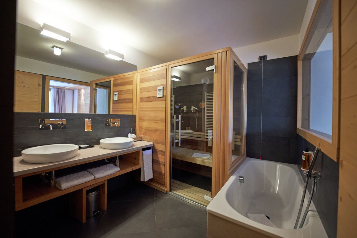 suite | bathroom | separate bathtub and shower, jetted bath, rainfall showerhead