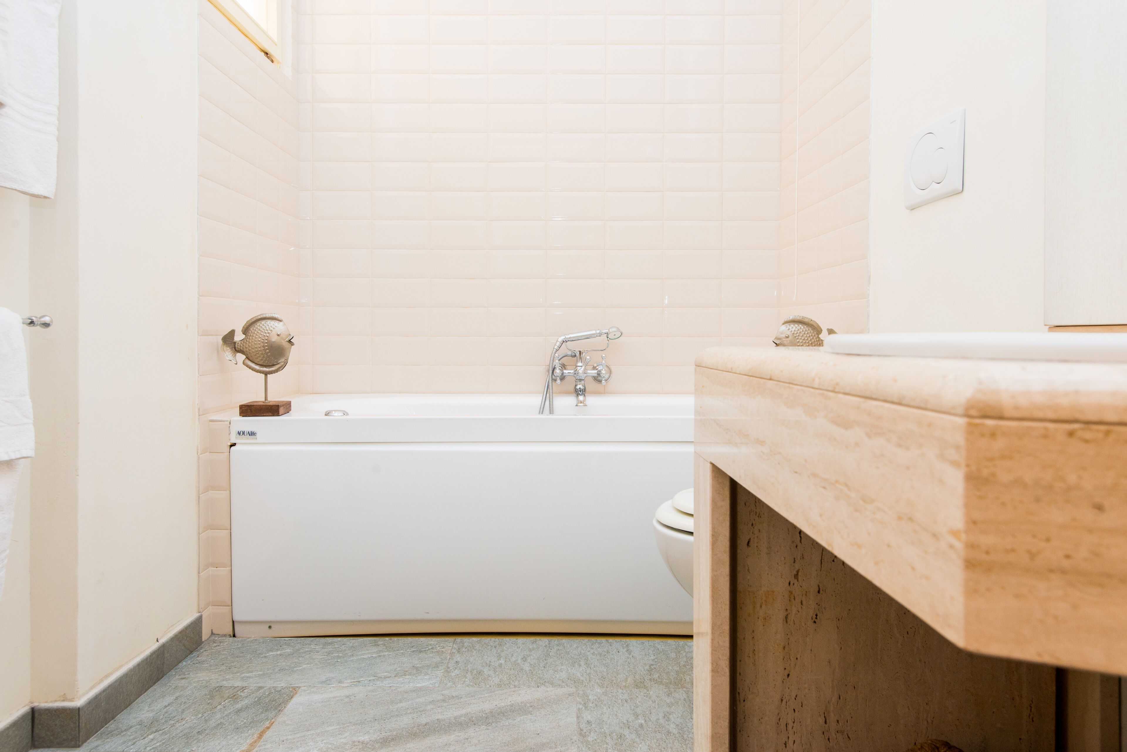 suite | bathroom | shower, hair dryer, bidet, towels