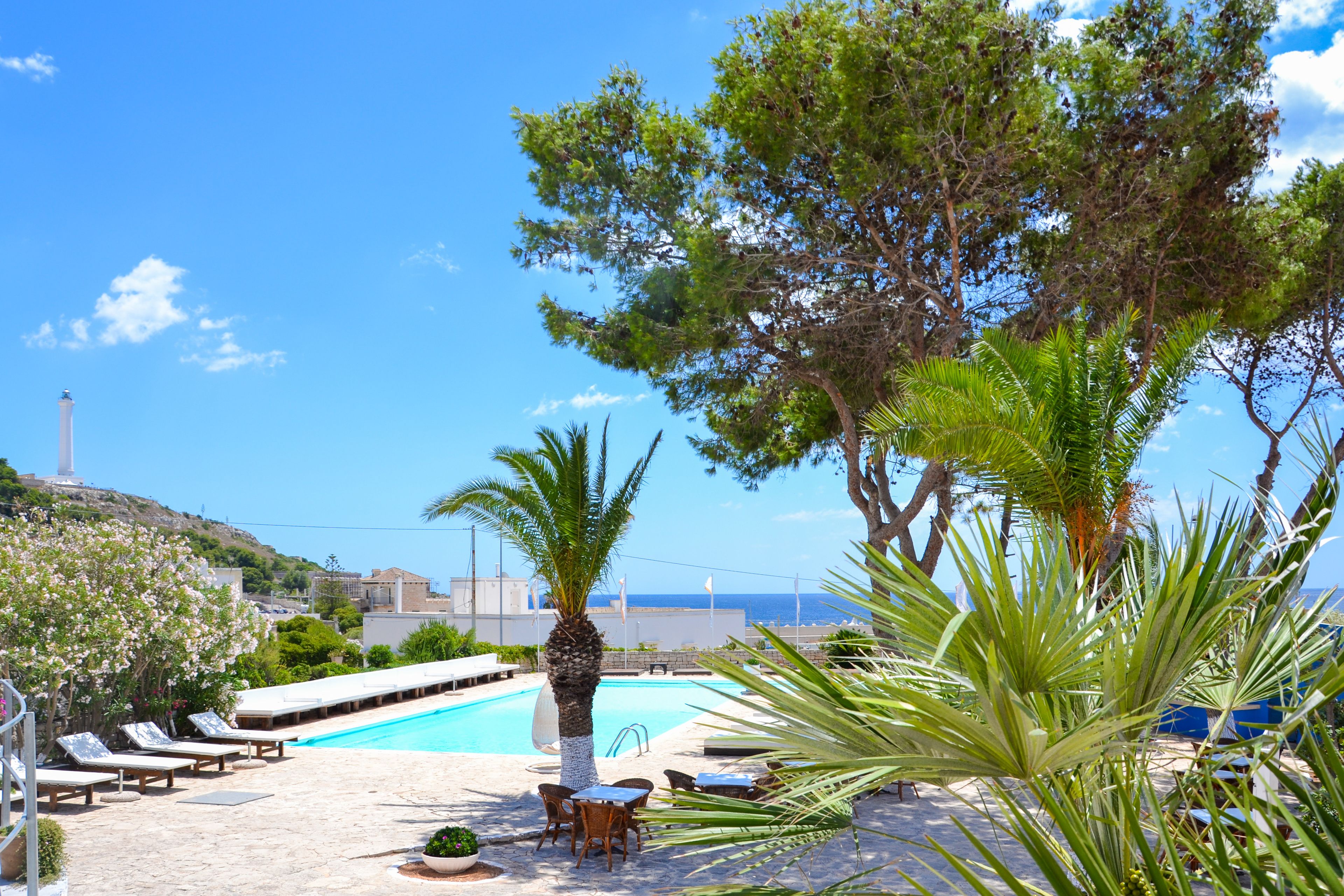 seasonal outdoor pool, pool umbrellas, pool loungers