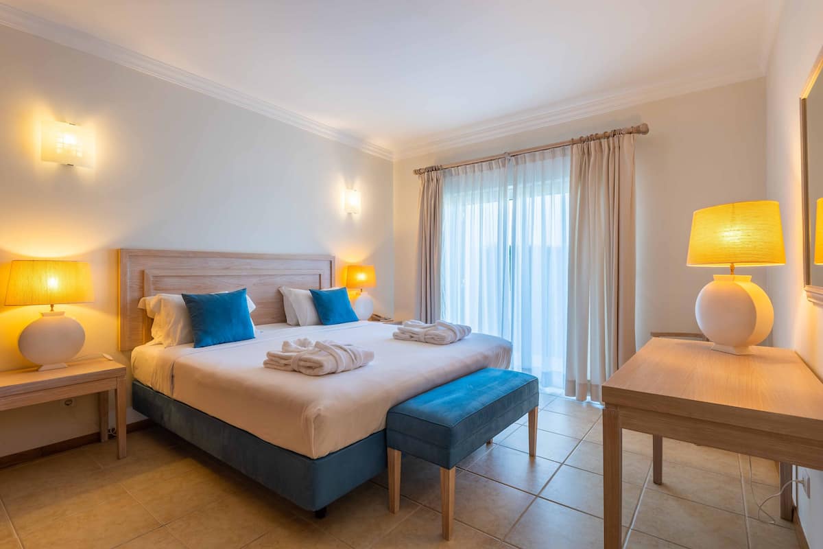 Family Apartment, 2 Bedrooms, Poolside | 1 bedroom, in-room safe, desk, blackout curtains